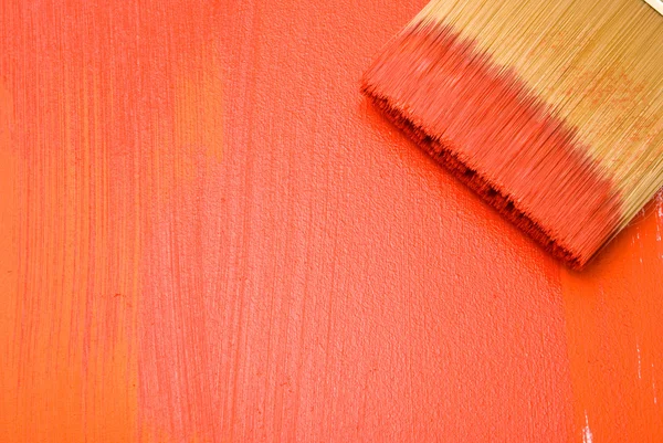 Faglig børste med rød maling – stockfoto