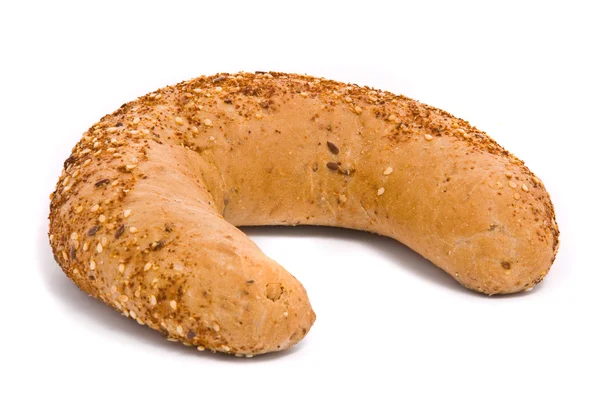 Único pão fresco em um fundo branco — Fotografia de Stock