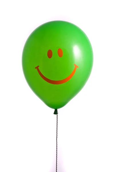 Zelený balón s úsměvem — Stock fotografie