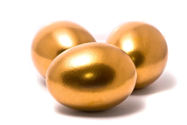 Trzy złote jaja — Zdjęcie stockowe
