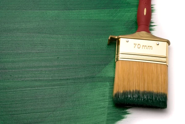 Escova com tinta verde — Fotografia de Stock