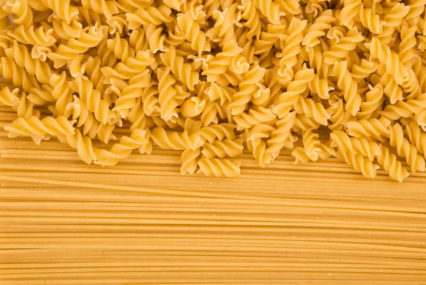 Raw pasta background — Stock Photo, Image