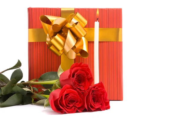 Red roses and gift boxes — Stock Photo, Image