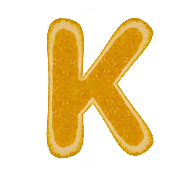 Цитрусовый шрифт. Буква K — стоковое фото