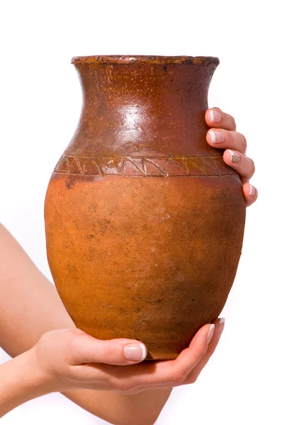 Old jug in woman hand — Stock Photo, Image