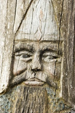 Face of hero, glyphic on wood clipart