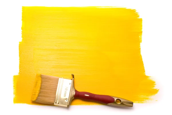 Professionele borstel met gele verf — Stockfoto