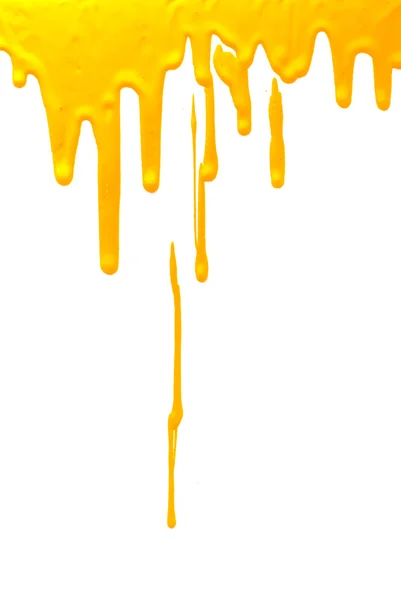 Yellow paint pouring on white — Stock Photo, Image