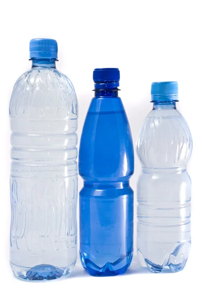 Três garrafas de água — Fotografia de Stock