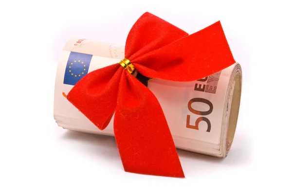 Rulle av euron pengar och röd rosett — Stockfoto