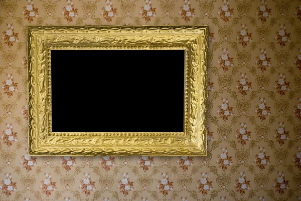 Старая гранж-стена с винтажной золотой рамой — стоковое фото