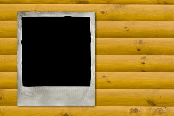 Ročníku foto rámeček na dřevo zeď — Stock fotografie