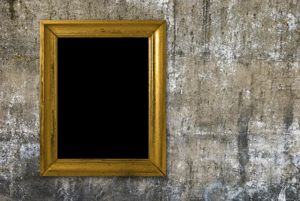 Grunge wall with vintage gold frame — Stock Photo, Image