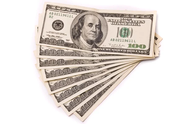 Beyaz arkaplanda dolar — Stok fotoğraf