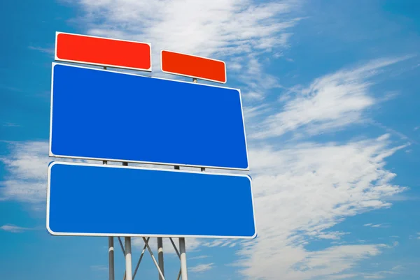 Road sign on sky background — Stock Photo, Image
