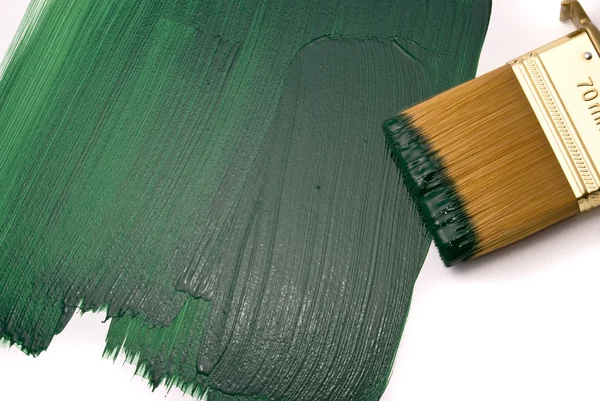 Escova com tinta verde — Fotografia de Stock