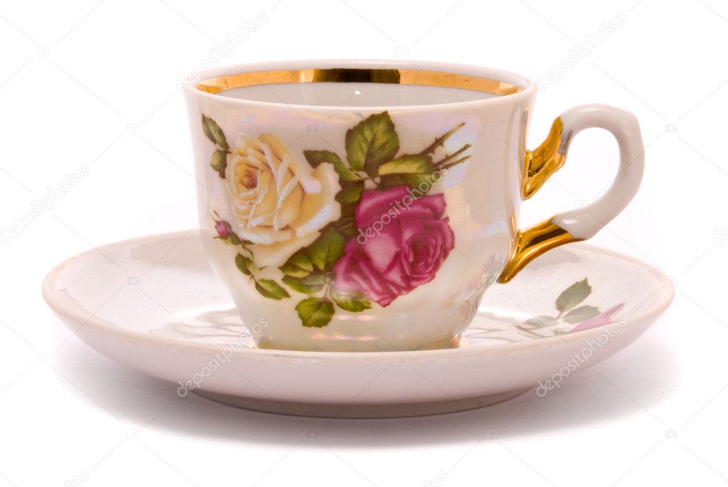 Teacup and saucer on a white