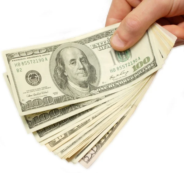 US Dollars in hand, over white — Stock Photo, Image
