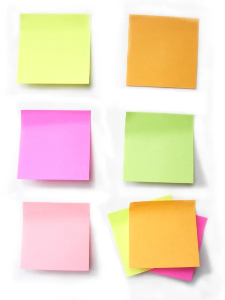 Papeles de nota de colores Imagen de stock