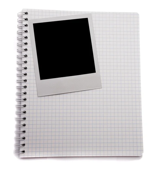 Spiral notepad and blank photo — Stock Photo, Image