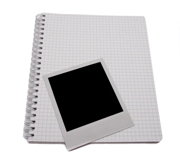 Spiral notepad and blank photo — Stock Photo, Image