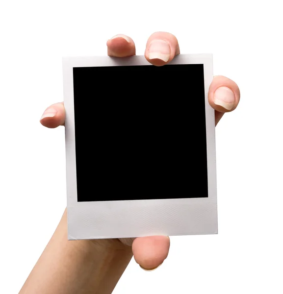 Κρατώντας το κενό polaroid, απομονωμένη — Φωτογραφία Αρχείου
