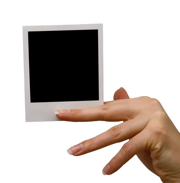 Boş polaroid holding, izole — Stok fotoğraf