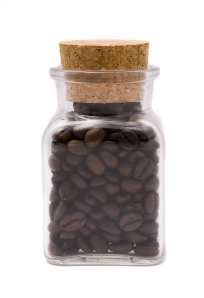 Granos de café en frasco de vidrio — Foto de Stock