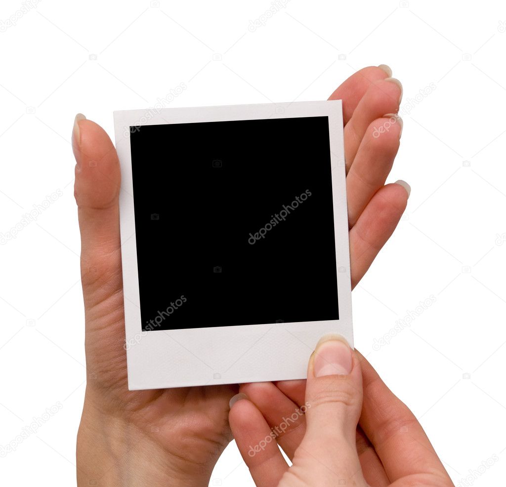 Holding blank polaroid, isolated