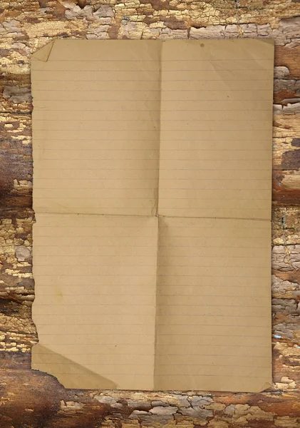 Vieux papier sur bois brun texture — Photo