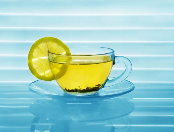 stock image A cup of tea with the lemon