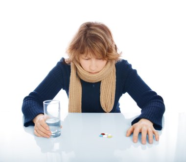 Sad woman with glass of water clipart