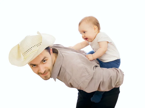Мужчина играет со своим ребенком — стоковое фото