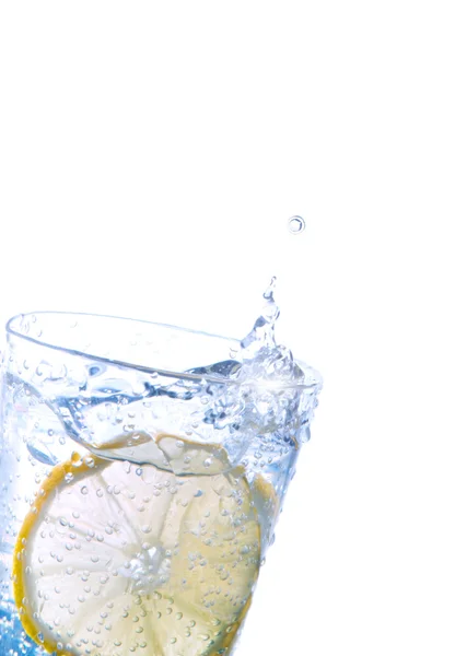 stock image Fresh lemon in sparkling water