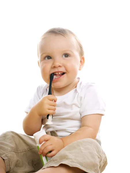 Ler barnet med en tandborste — Stockfoto