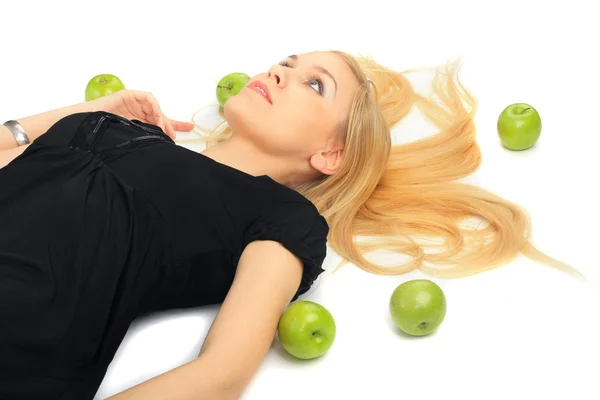 Girl with a green apple — Stock Photo, Image