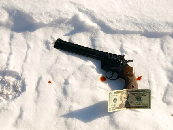 Gun in snow — Stock Photo, Image