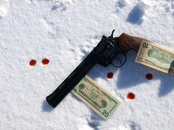 Gun in snow — Stock Photo, Image