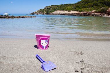 Toys at Cala d'Algairens clipart