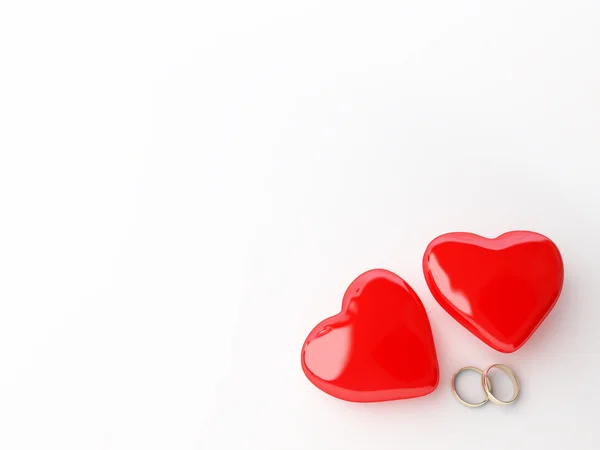 Anéis de casamento e coração — Fotografia de Stock