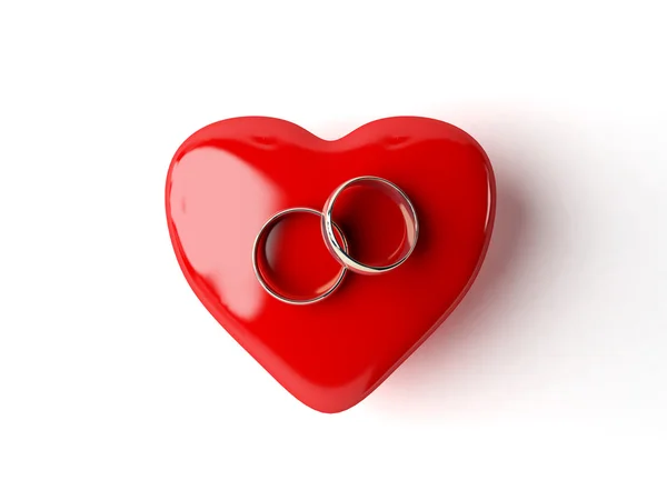 Stock image 3d wedding rings and heart