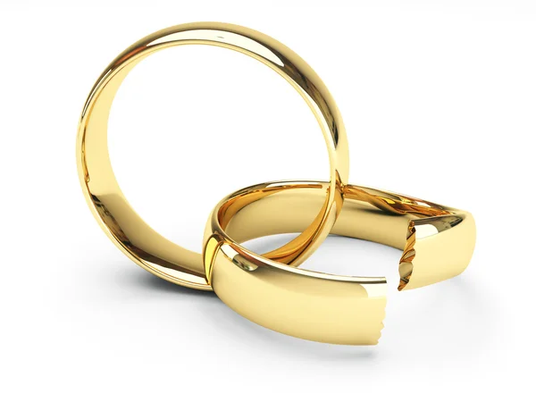 Σπασμένα χρυσά γαμήλια δαχτυλίδια Εικόνα Αρχείου