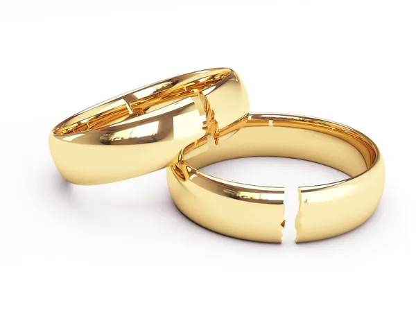 Σπασμένα χρυσά γαμήλια δαχτυλίδια Royalty Free Εικόνες Αρχείου