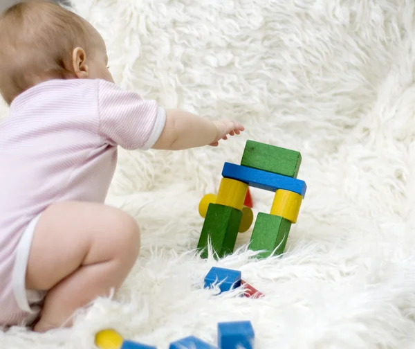 Child playing with a toy — Stock Photo, Image