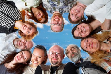 Happy team. On blue sky clipart