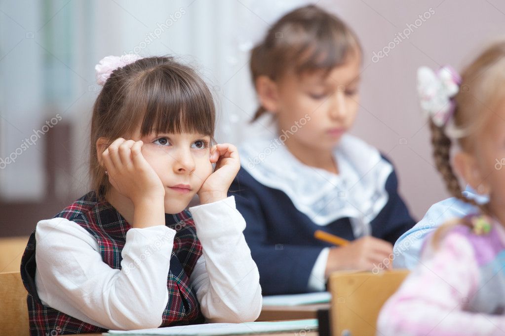 Small Schoolgirl in classroom.