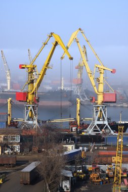 Cranes in harbor clipart