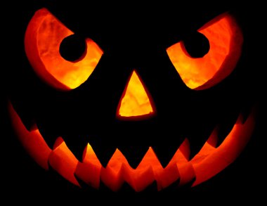 Halloween pumpkin on black clipart