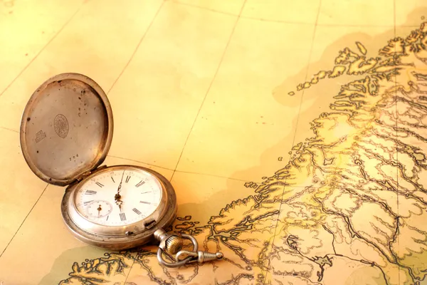 Ancient map with old silver watch — Stock Photo, Image