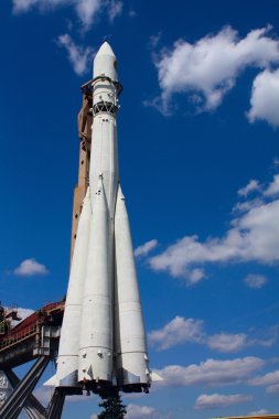 Rocket monument in park clipart